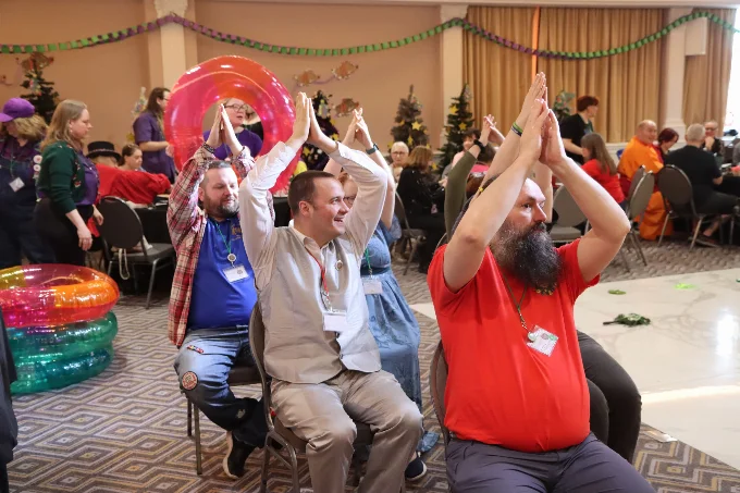 Pictures of campers playing games at The Hogs Ball at Llamedos Holiday Camp