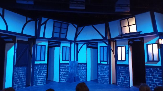 Stage at Night Watch showing an Ankh-Morpork street scene