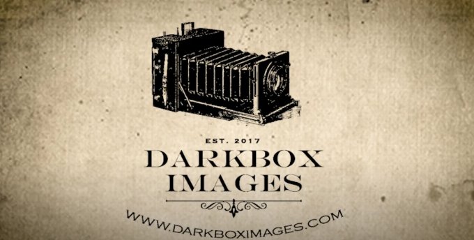 Darkbox Images Images of a Victorian vintage camera with the words Darkbox Images